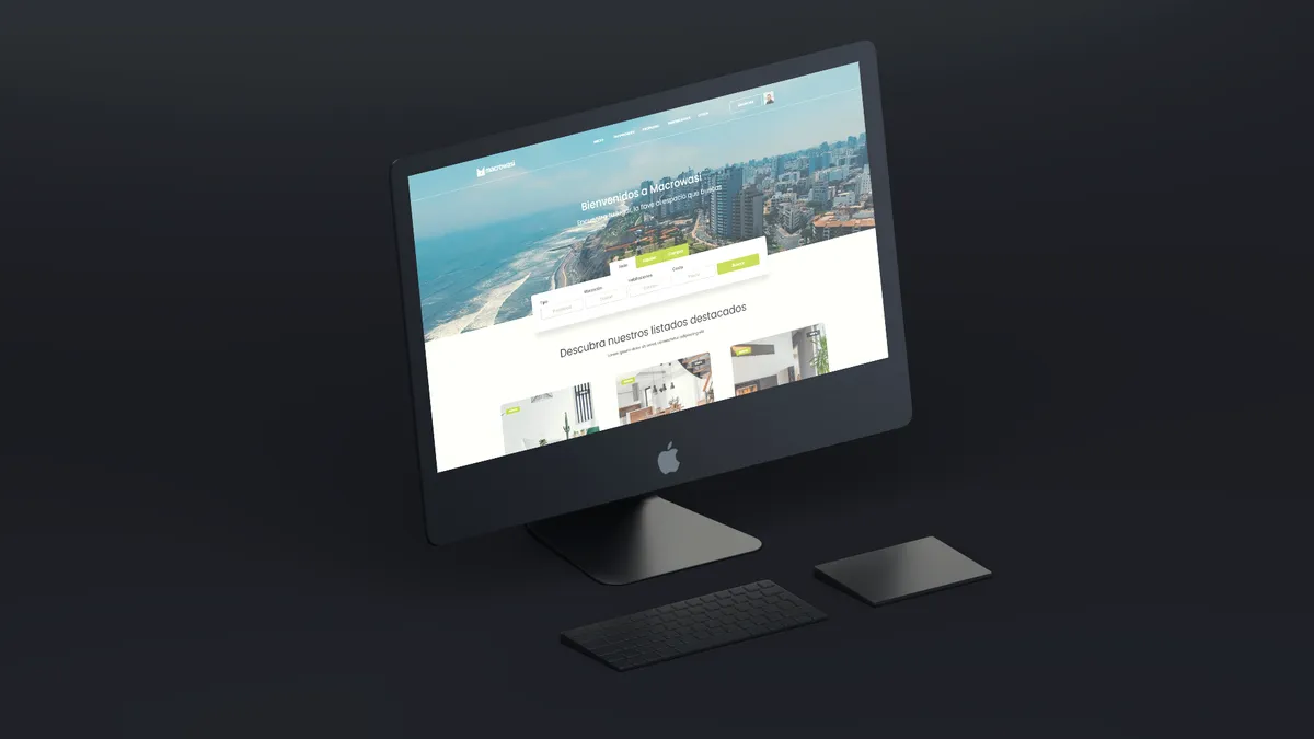 Sitio web de Macrowasi con fotografía de una zona costera mostrado en un iMac