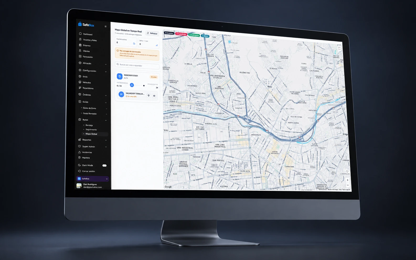 Mapa global en tiempo real de Nexus Tracking System con el menú de empresas, envíos, vehículos, repartidores, órdenes, guías, rutas y reportes, en un iMac